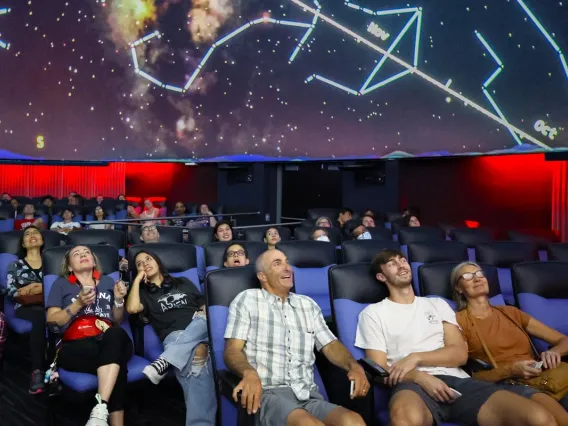 Families in Flandrau Planetarium enjoying the show