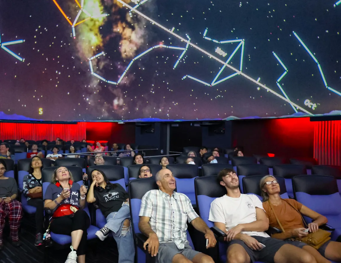 Families in Flandrau Planetarium enjoying the show