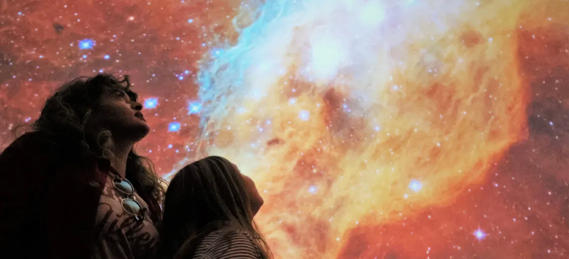 Mother and daughter at Flandrau planetarium