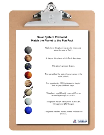 clipboard showing first page of solar system scavenger hunt 