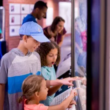 Family visiting exhibits at Flandrau science center